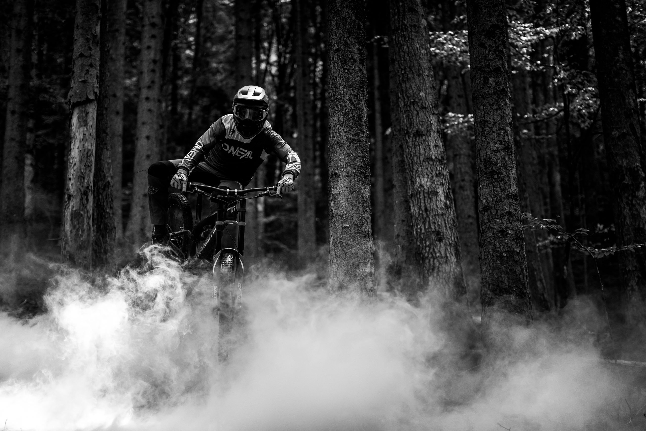 Riding the smoke: Benoit Gurnel with Bluegrass Legit Carbon Helmet, Maxime Rambaud with Camera and Creativity.