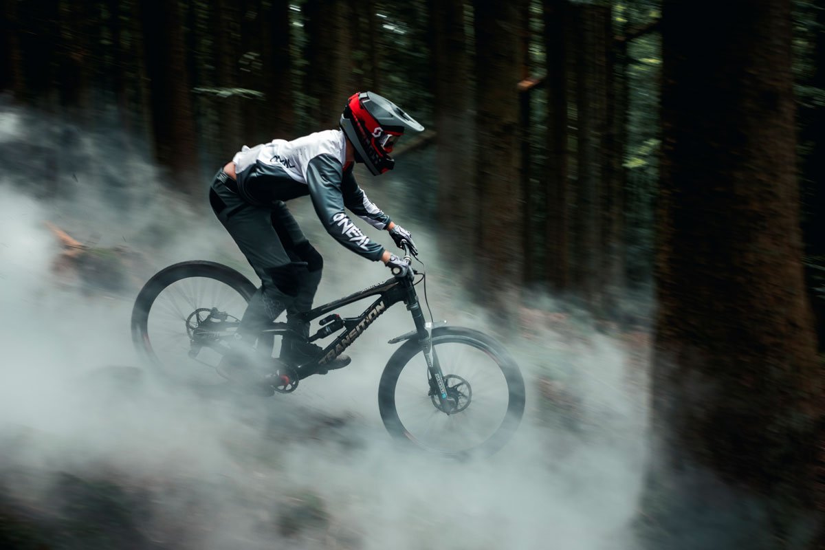 Riding the smoke: Benoit Gurnel with Bluegrass Legit Carbon Helmet, Maxime Rambaud with Camera and Creativity.